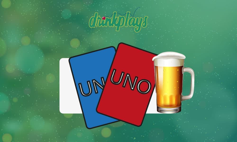 A fan of red, yellow, green, and blue number cards next to a bottle on a party table